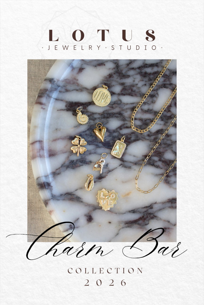 A woman is wearing a charm bar necklace