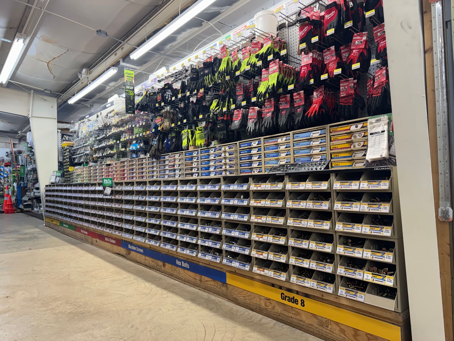 Stack of plywood boards, layers visible. Brown wood.