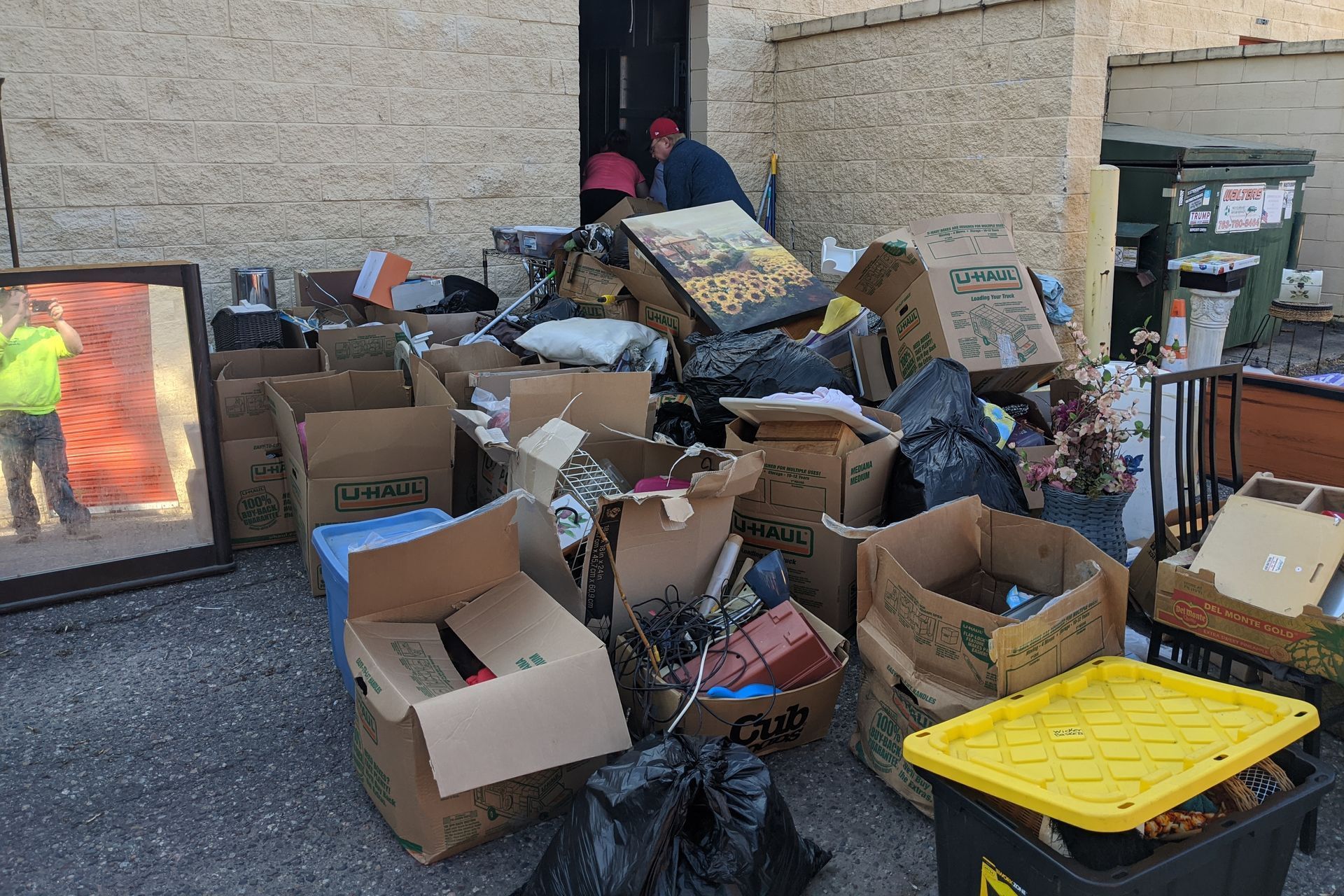 a pile of cardboard boxes with one that says cub on it