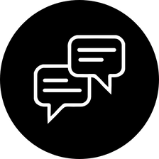 Two white speech bubbles on a black circle, indicating conversation.