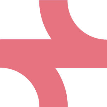 Pink rail track with one curved track intersecting a straight track.