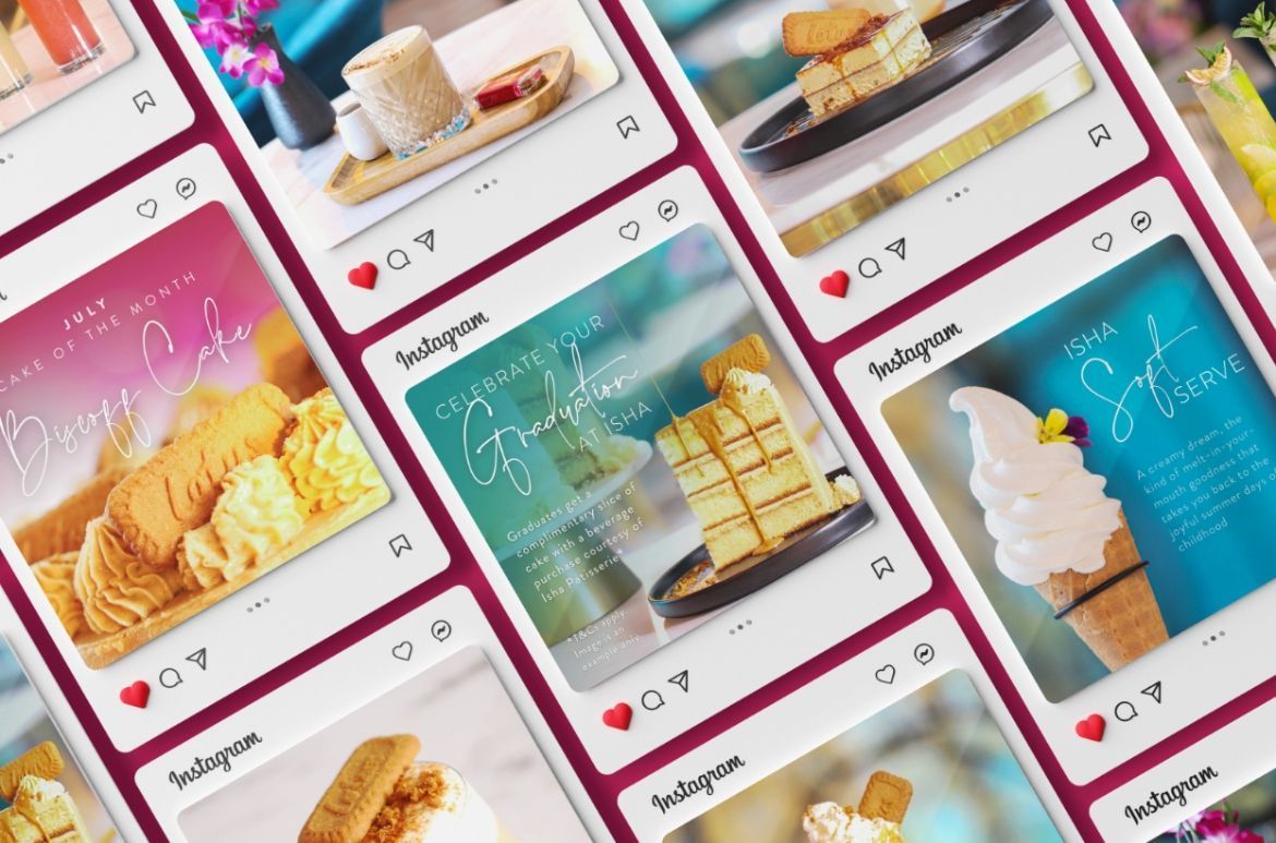 Three business people reviewing design layouts around a large table.