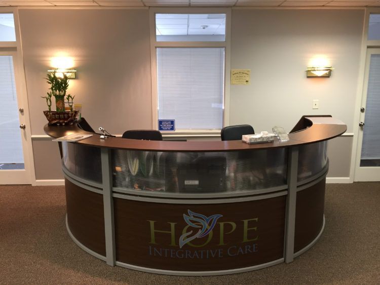 a reception desk with the word hope on it