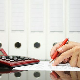 Reading Through Paperwork - Accountant in Hanover, MA