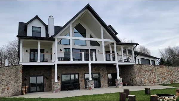 A large house with a lot of windows and balconies