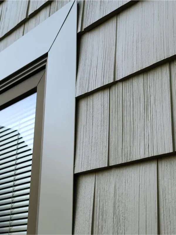 A close up of a window with blinds on it