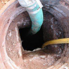 Septic pipes going deep into hole