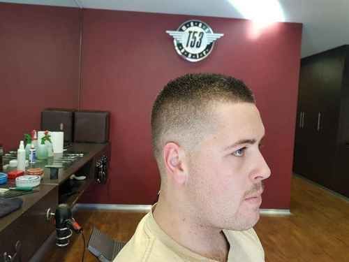 Man With Faded Haircut In Profile View — Bolton Brothers Barbers in Erina, NSW