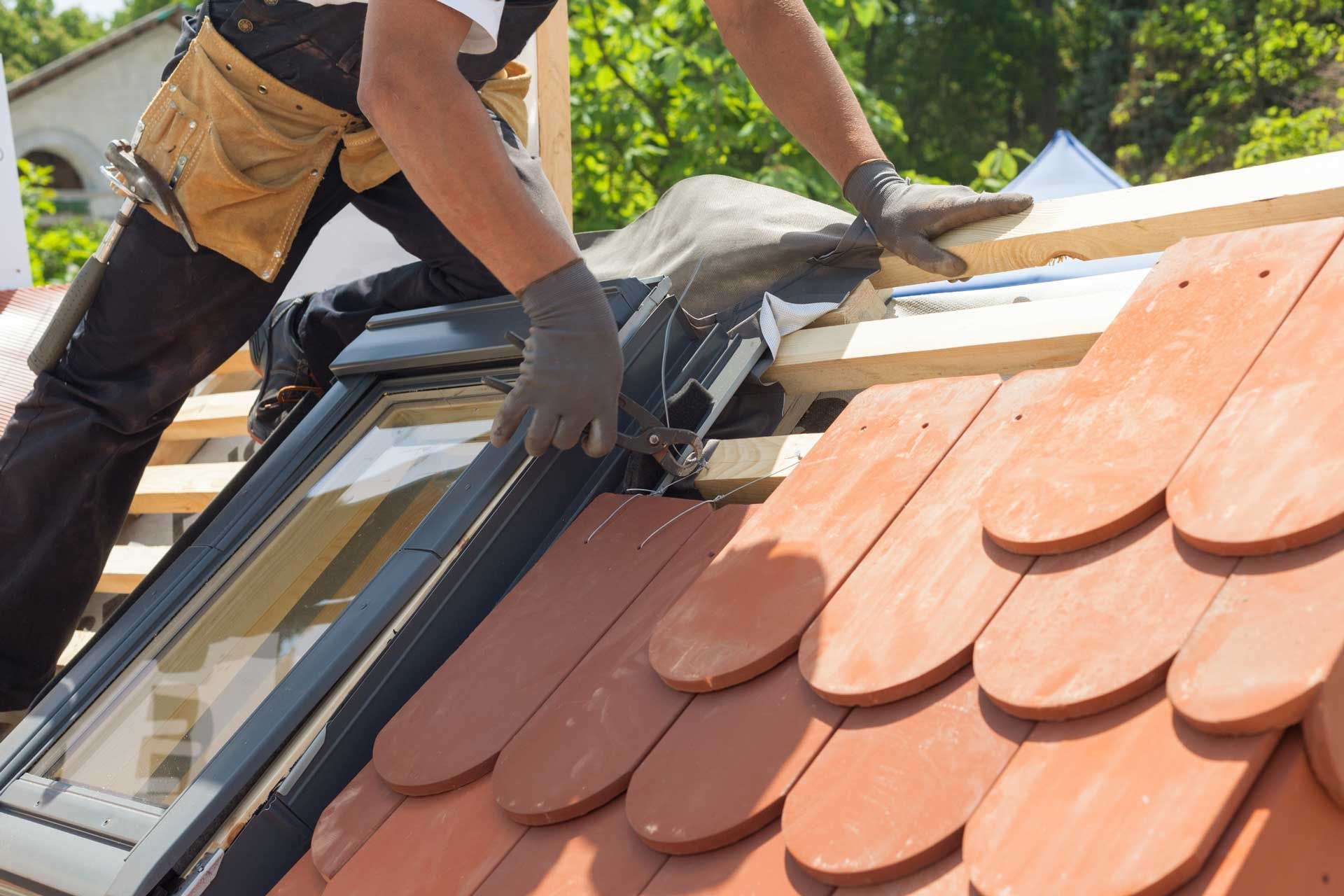 Person working on a roof.