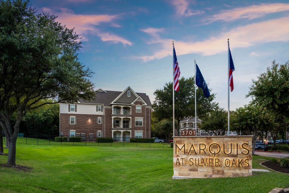 Apartment signage at Marquis at Silver Oaks in Grapevine, TX.