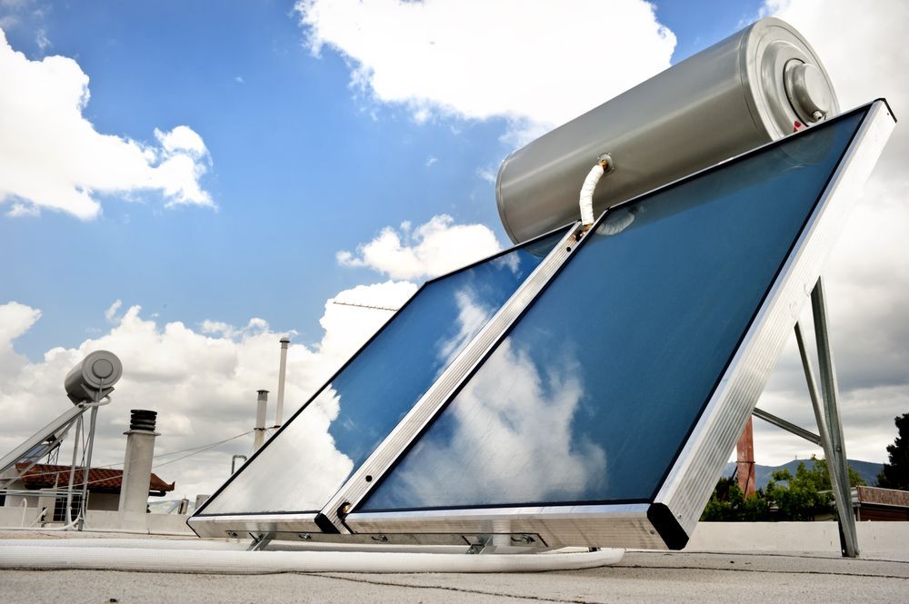 A Solar Panel On A Roof With A Blue Sky In The Background — Trusted Energy Solutions In Everton Hills, QLD