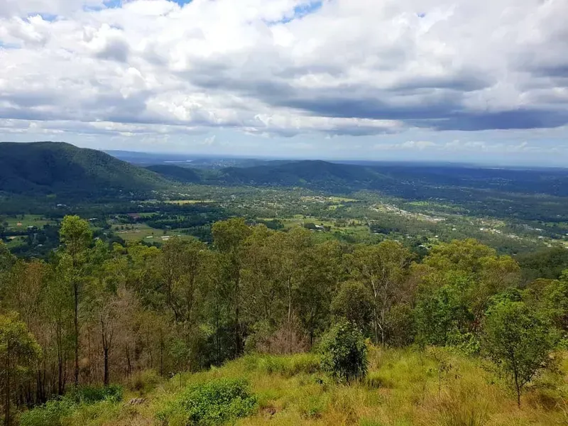 A View Of A Valley From The Top Of A Mountain — Trusted Energy Solutions In Samford Valley, QLD
