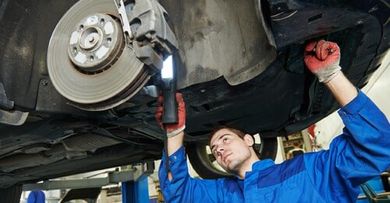 Replacing Disc Pads — Mechanic Repairing Brakes in Mansfield,OH