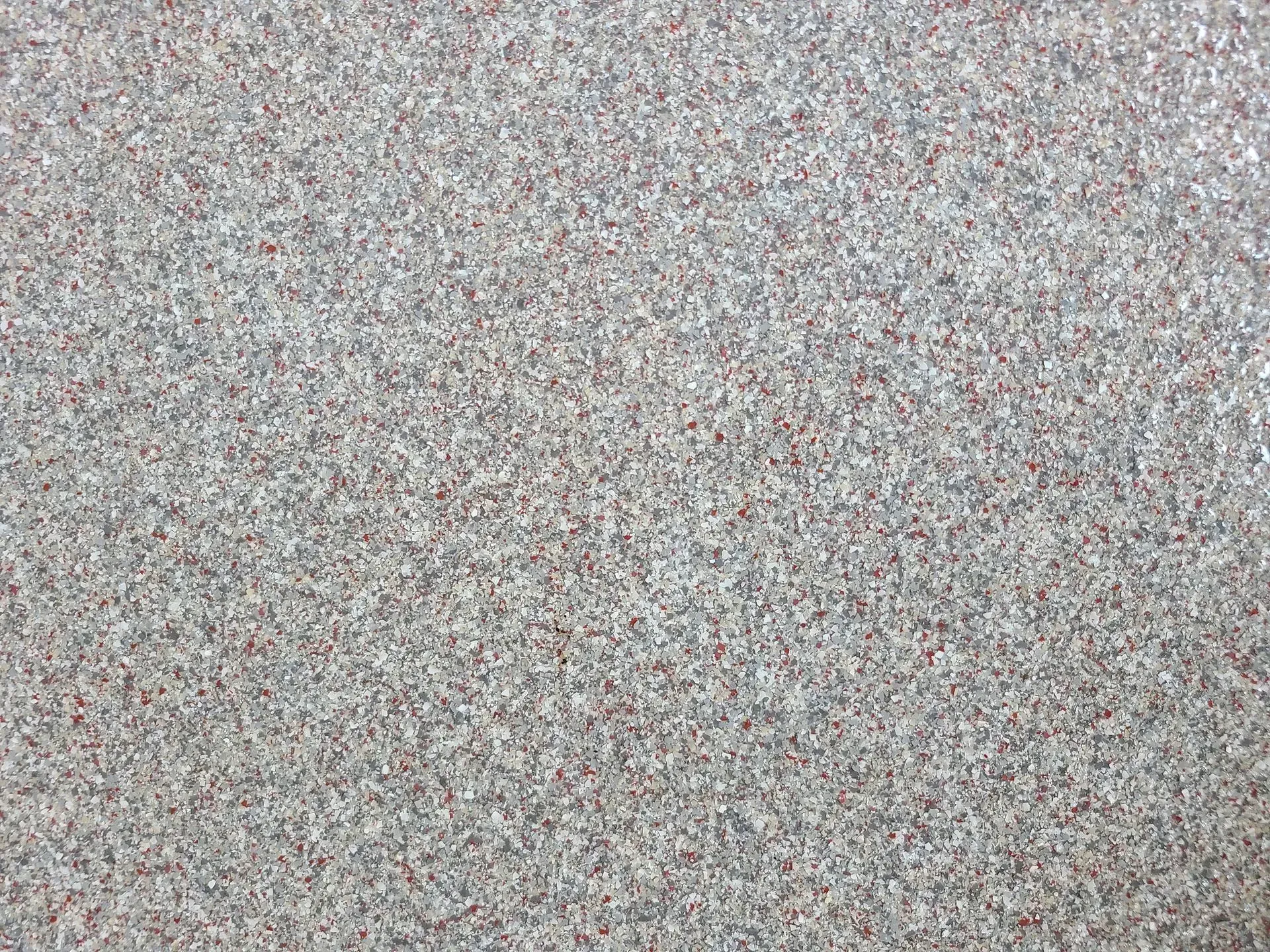 A close up of a gray carpet texture.
