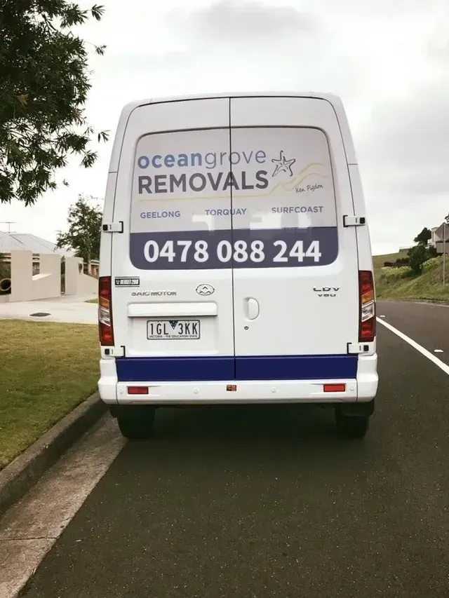 An Ocean Grove Removals Van is Parked on the Side of the Road — Ocean Grove Removals In Whittington, VIC