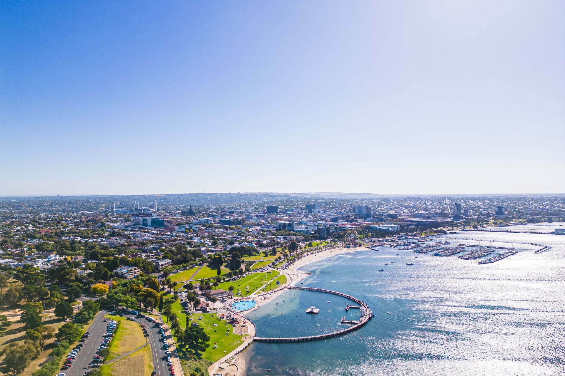 Aerial View of a Sunny Coastal City With a Park, Beach, and Marina — Ocean Grove Removals In Geelong, VIC