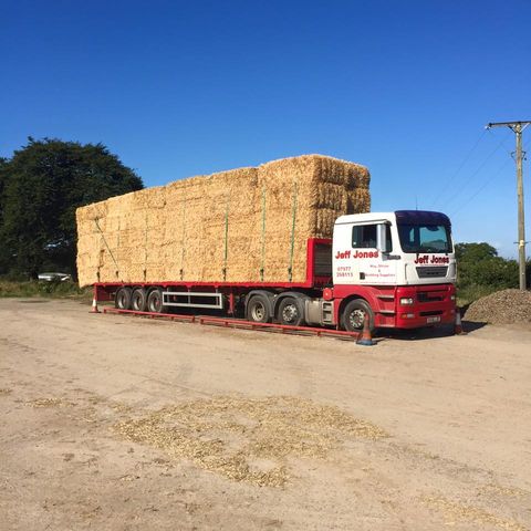 Large lorry carrying hay