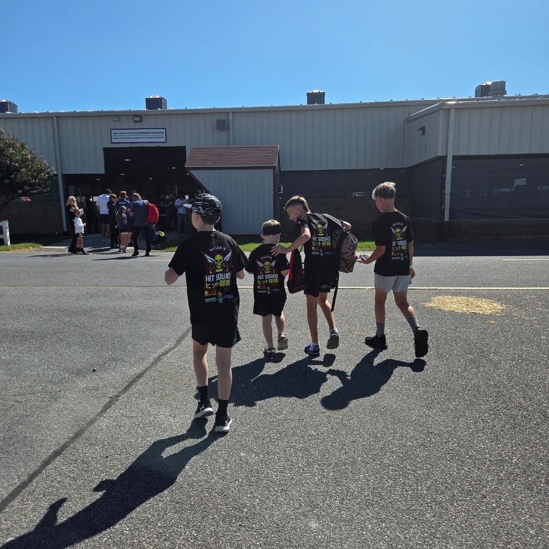 Kids practicing safe partner drills at Killer B Combat Academy in Oakhurst, NJ, building confidence 