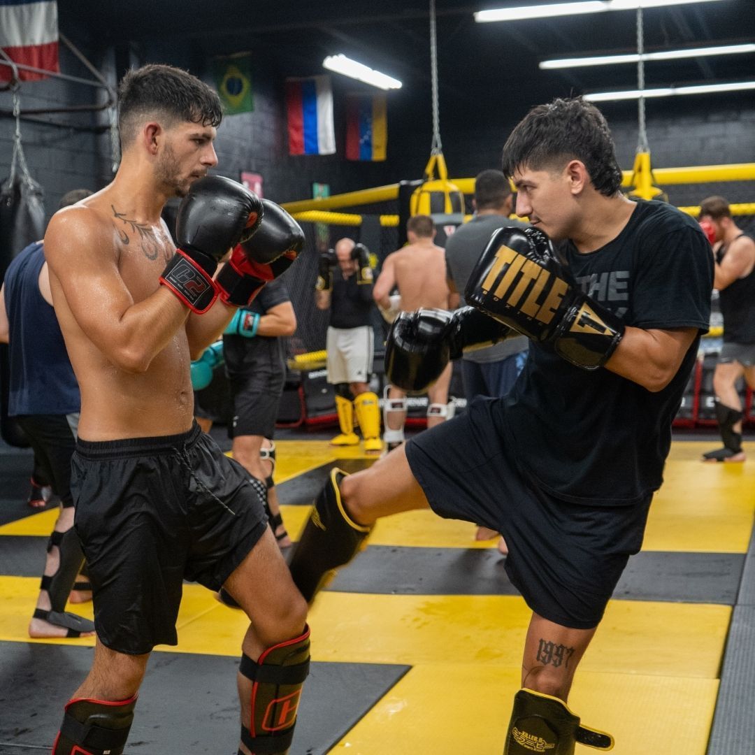 Adults drilling MMA techniques at Killer B Combat Academy in Oakhurst, NJ, building focus and confidence.