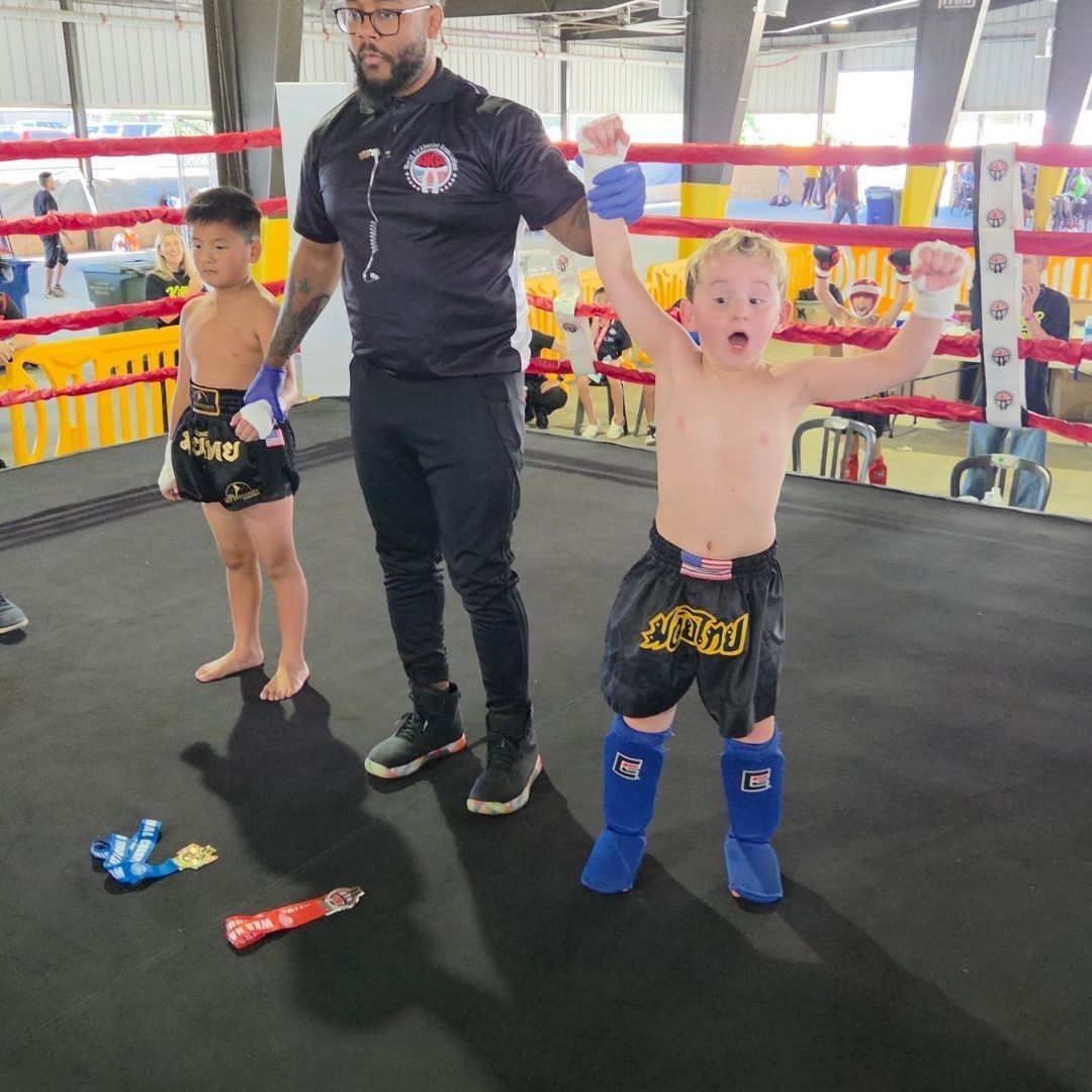 Kids practicing focused drills at Killer B Combat Academy in Oakhurst, NJ, building confidence.