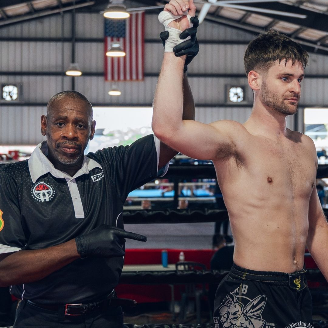 Adults training striking and grappling at Killer B Combat Academy in Oakhurst, NJ for fitness.