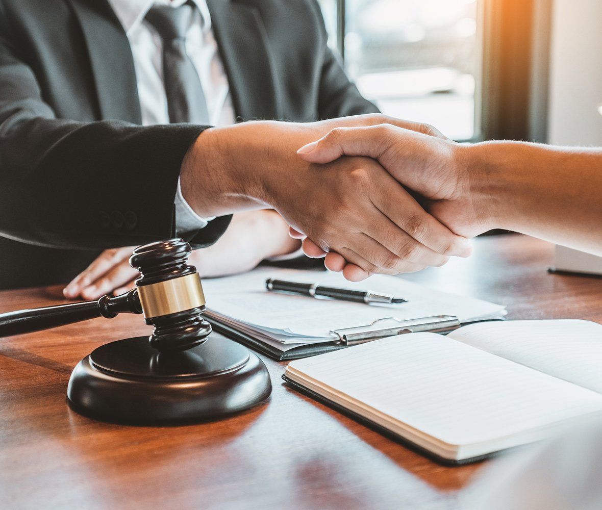 Lawyer Shaking Hands to Client — Montgomery, AL — Donohoe & Stapleton, LLC
