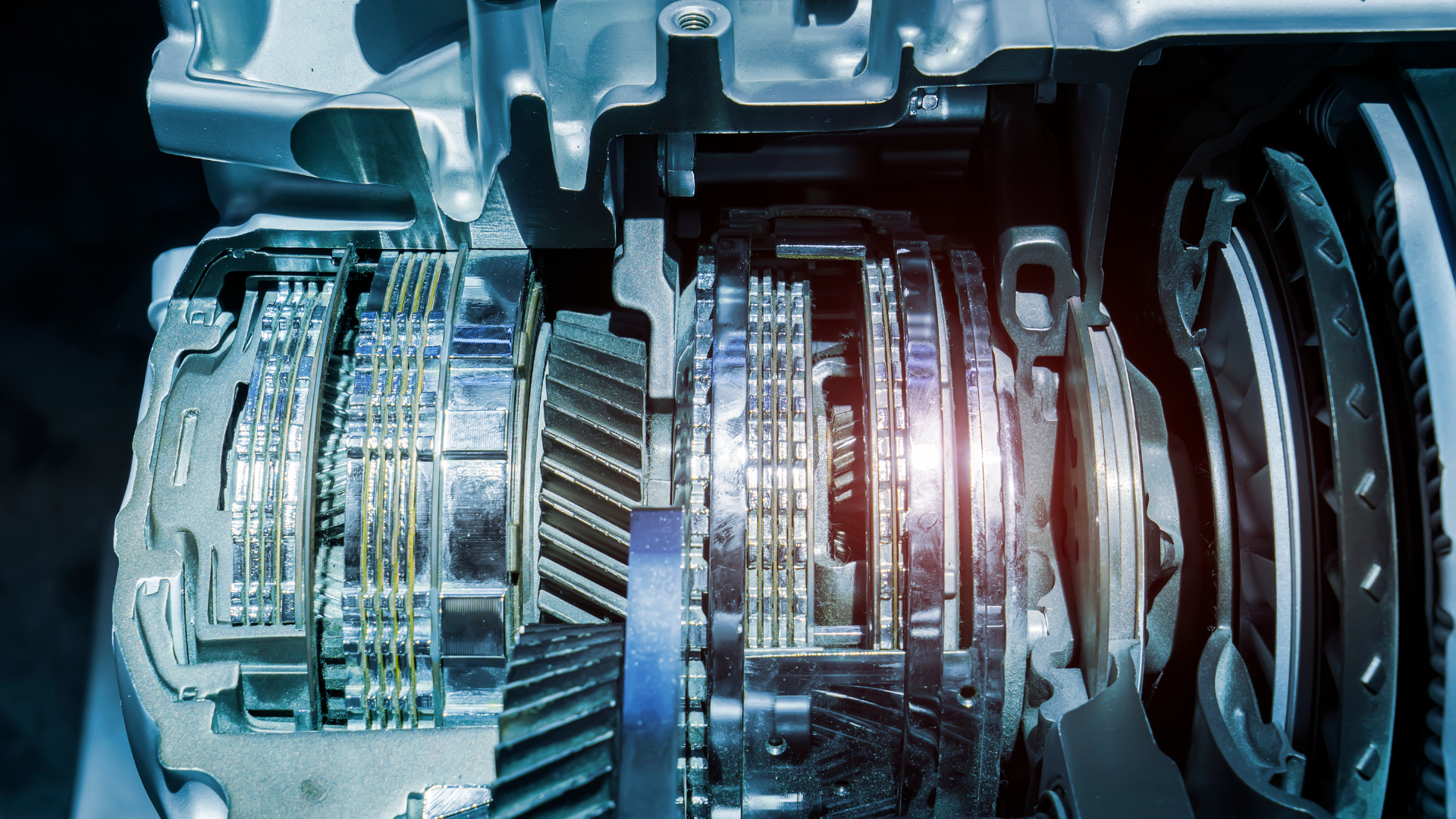 A pile of silver squares on a blue surface