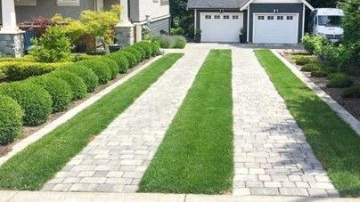 sod and interlock brick driveway