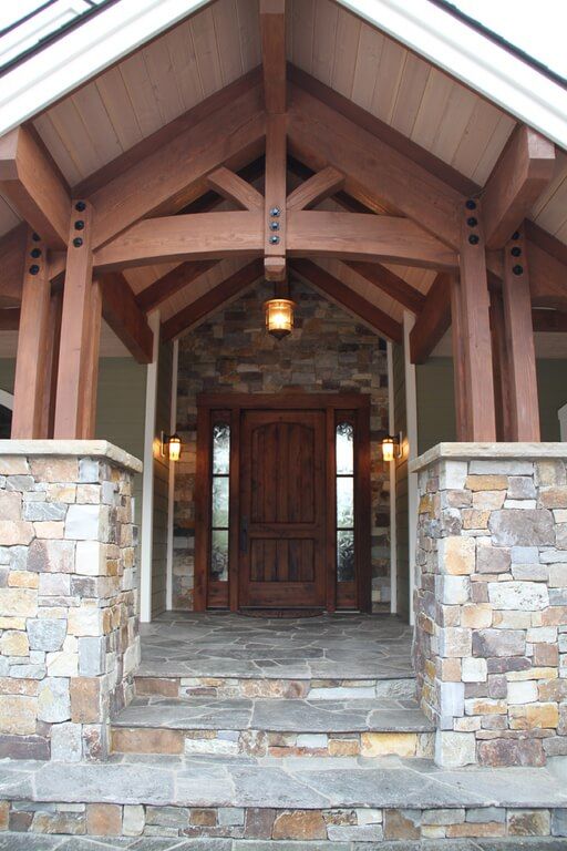 A house with a wooden door and stone steps