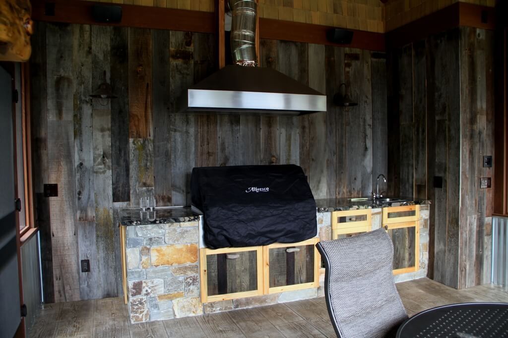 There is a grill in the middle of the room.