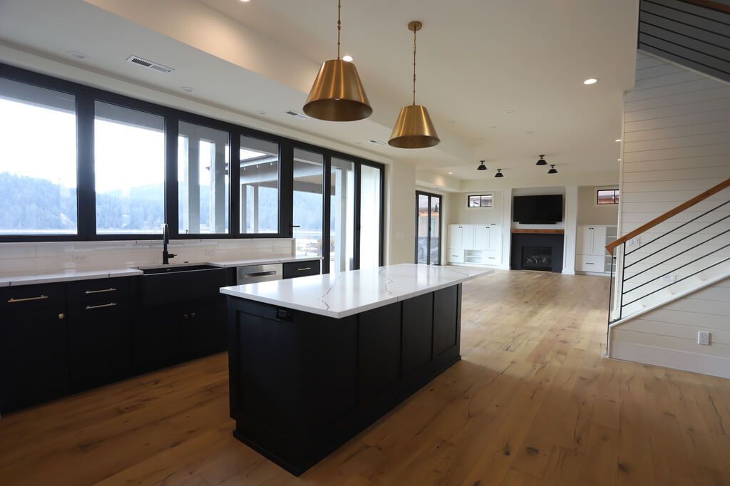 There is a large island in the middle of the kitchen.