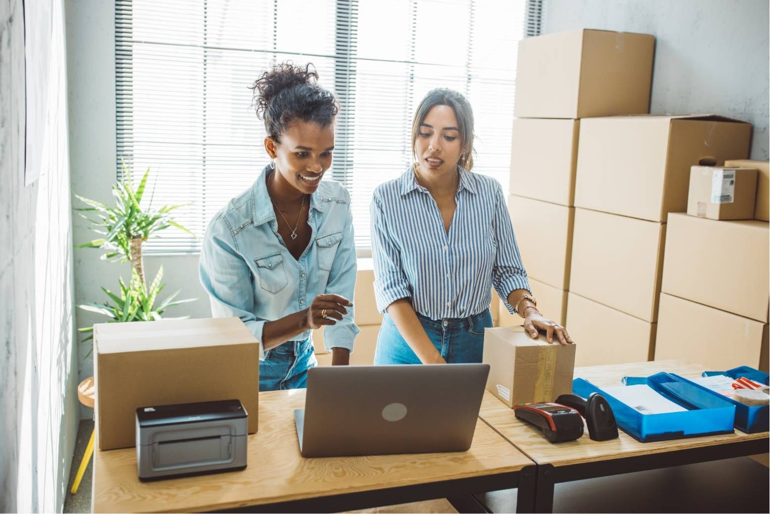 Smiling Business Owner Handling Item to Customer