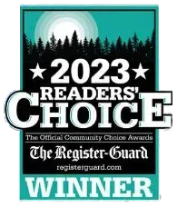 2023 Readers' Choice award from The Register-Guard: teal square with stars, forest, sun, and 