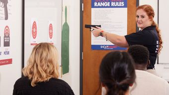 teacher teaching handgun class