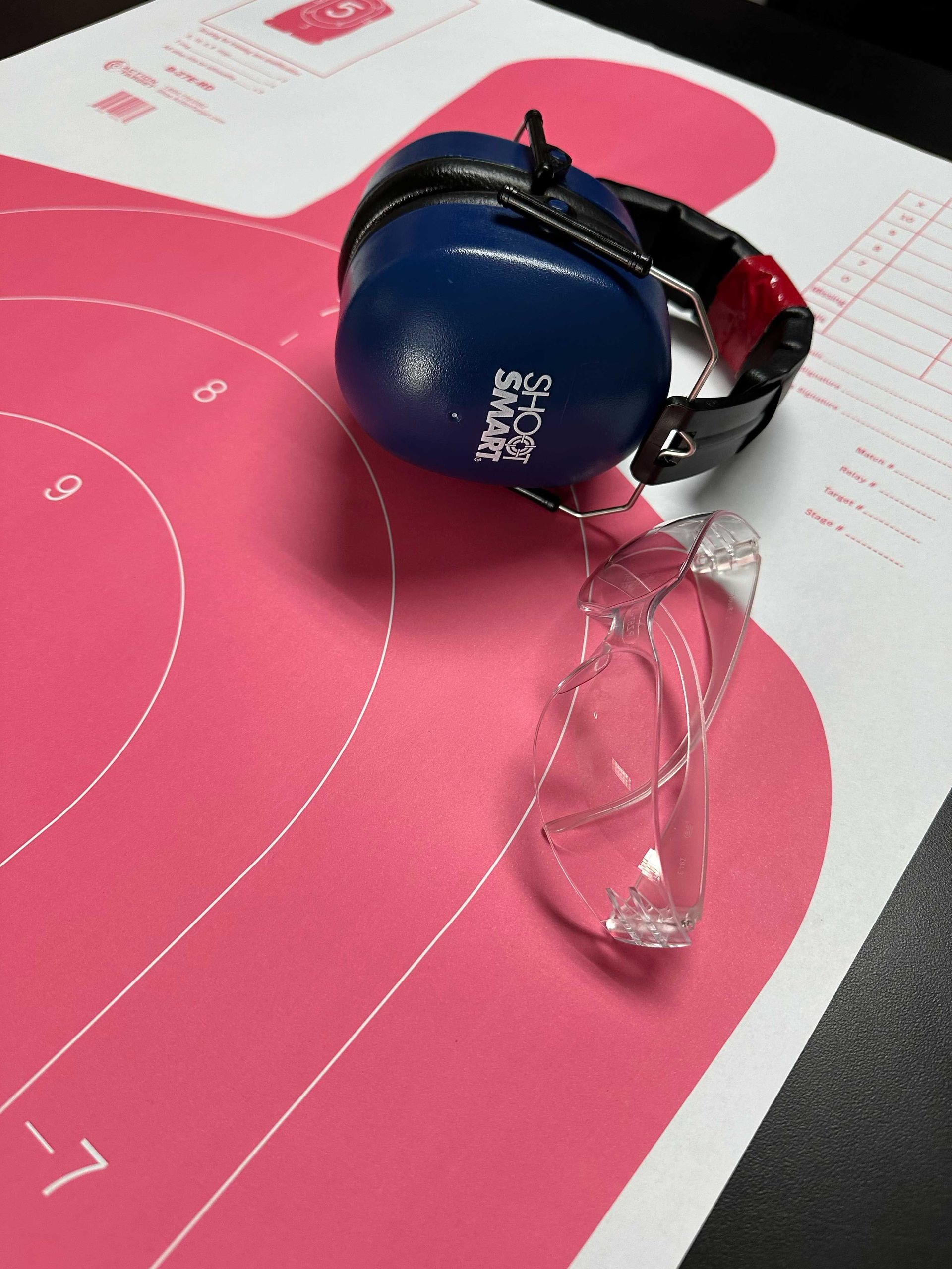 shooting target with ear and eye protection