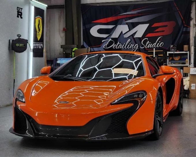 Orange sports car with PPF by CM3 Detailing Studio & Ceramic Coating in Elgin, IL