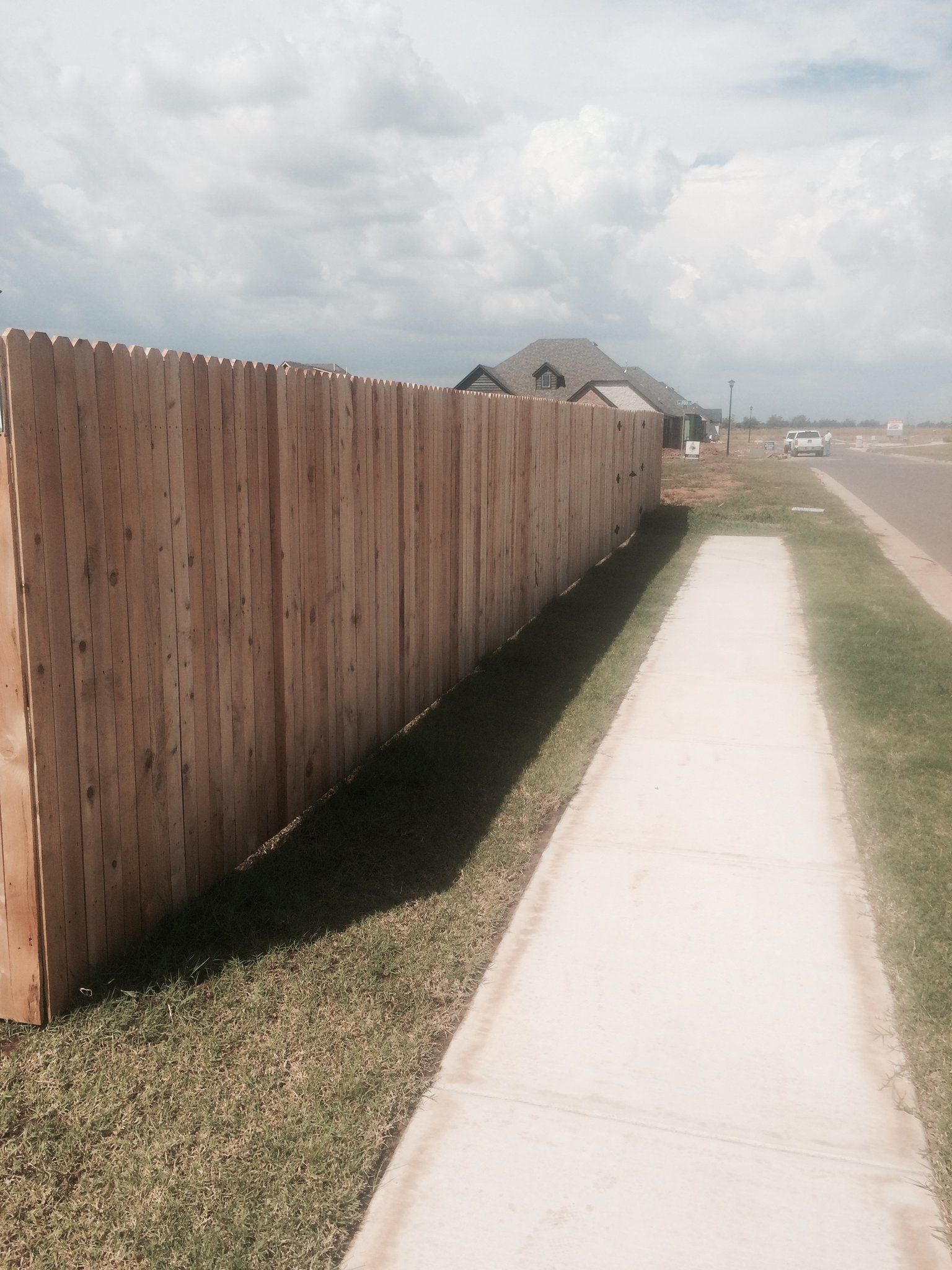 Oxford Brown Quality Fence — Oxford Brown Fence on Sidewalk in Oklahoma City, OK