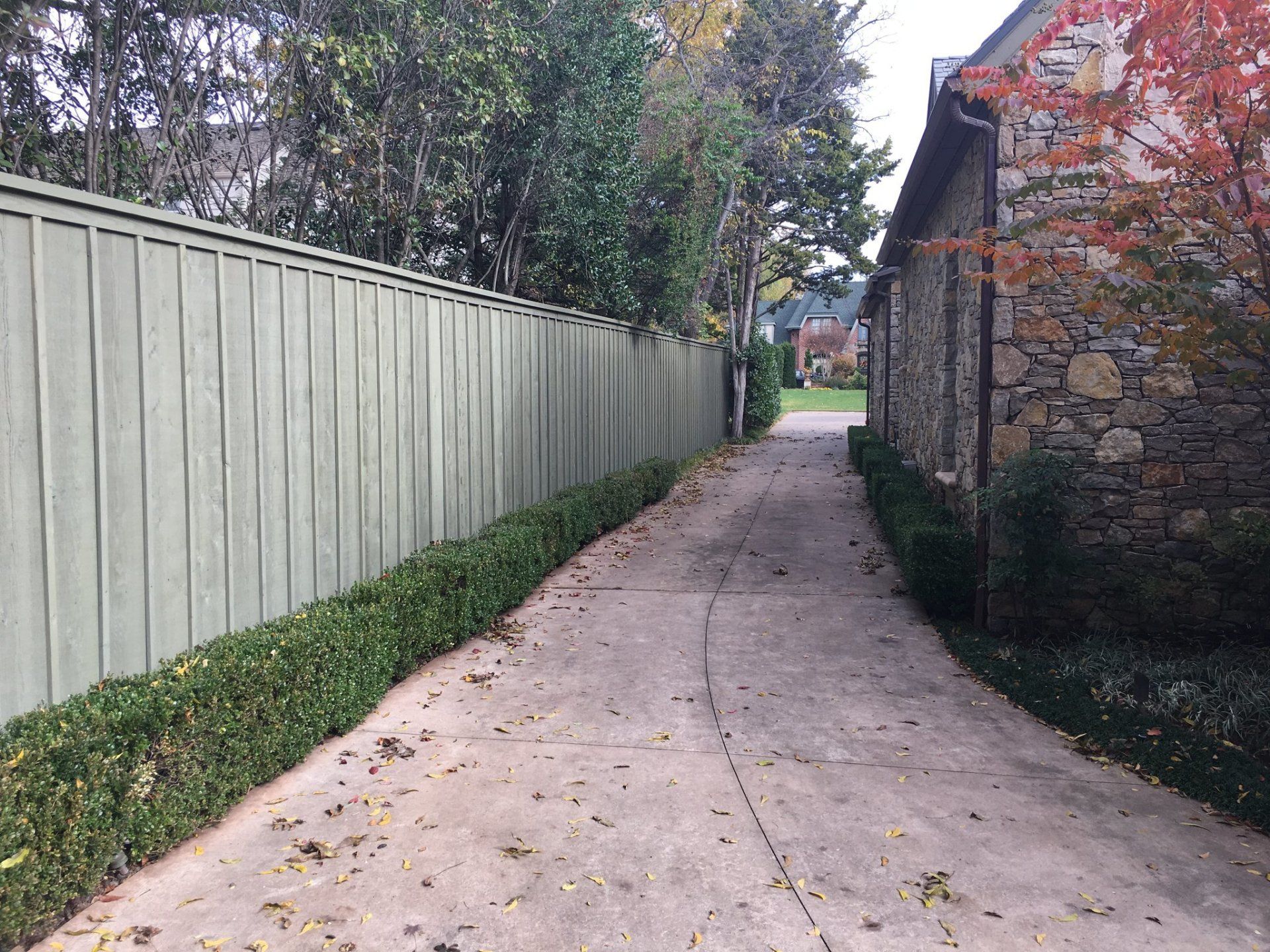 Affordable Greystone Fence — Greystone Fence on Sidewalk in Oklahoma City, OK