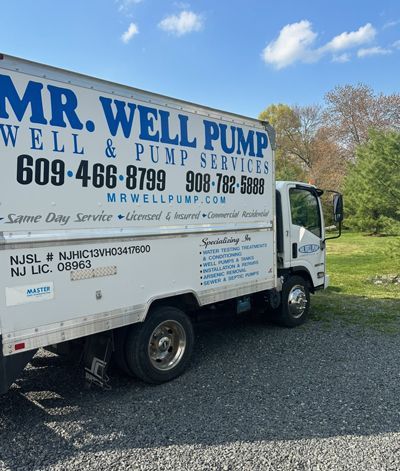 A Mr. Well Pump Truck Is Parked On A Gravel Road - Lambertville, NJ - Mr. Well Pump