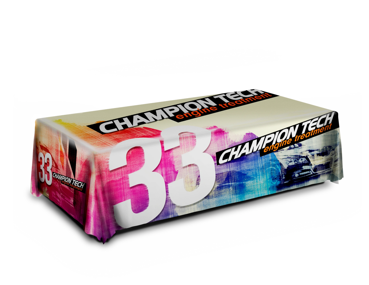 Table covered with a custom Champion Tech cloth featuring the number 33 and a colorful design.