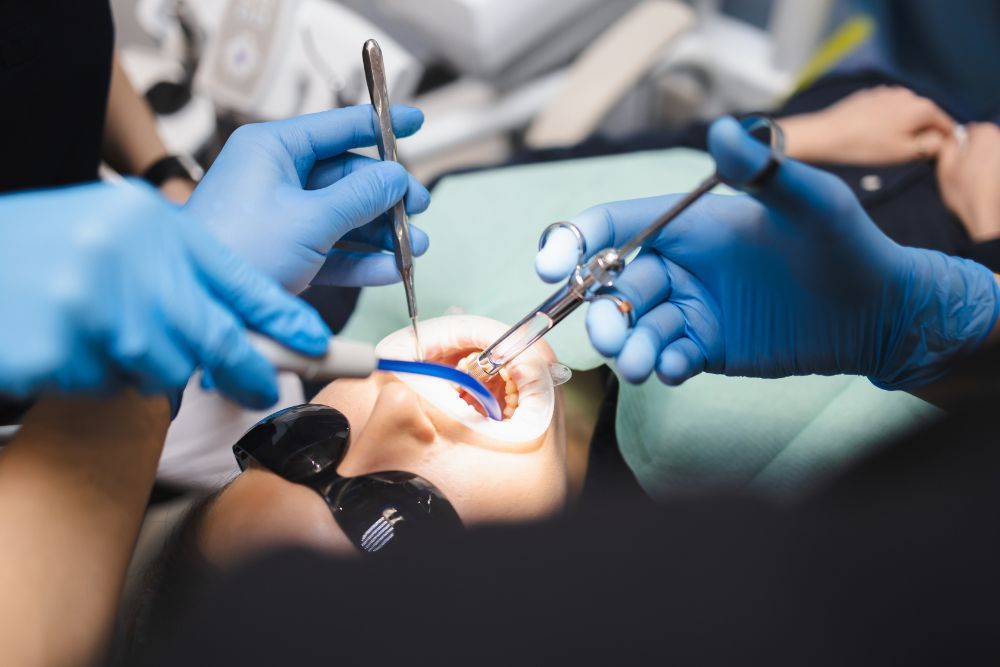 Doctor giving anesthesia to the patient before root canal surgery