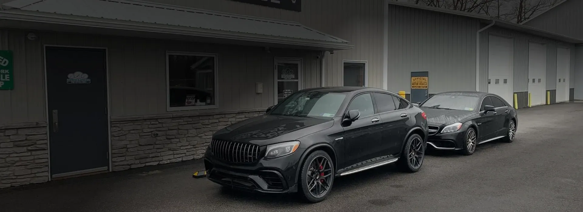 Two black cars parked in front of our shop | Eurocharged