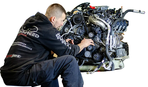 Mechanic working on engine | Eurocharged