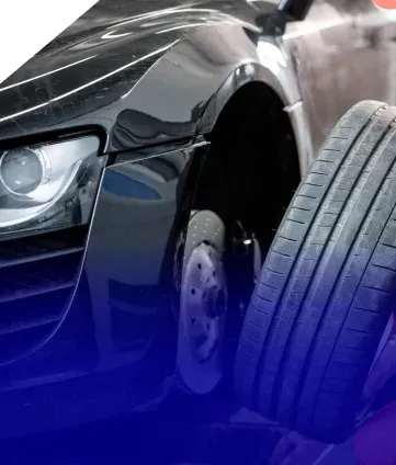 Tire being removed or replaced for black car | Eurocharged