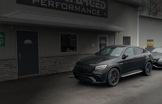 Two black cars parked in front of our shop | Eurocharged