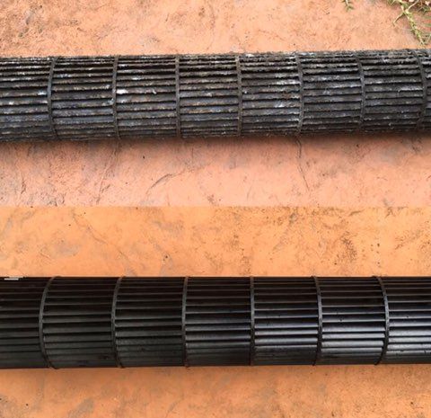 Comparison of dirty and cleaned HVAC blower wheels; showing dust accumulation.