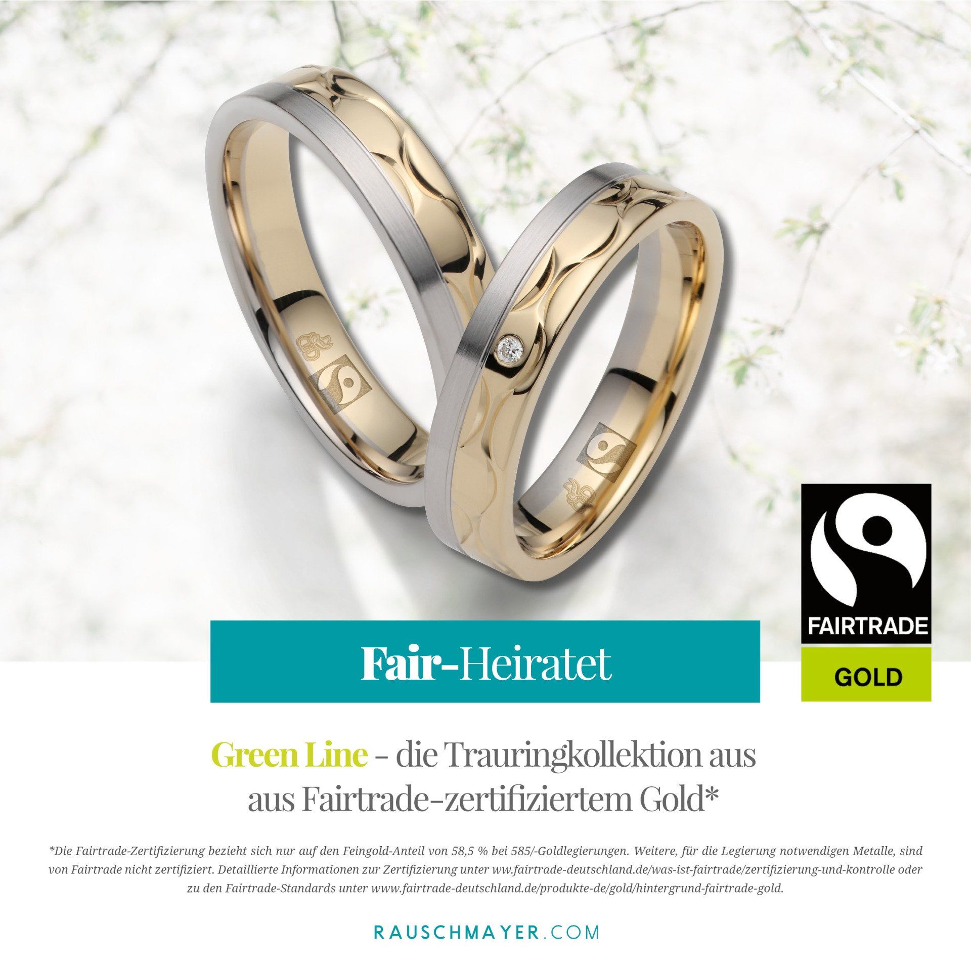 Ein Paar Eheringe mit den Worten Fairtrade Gold auf der Unterseite