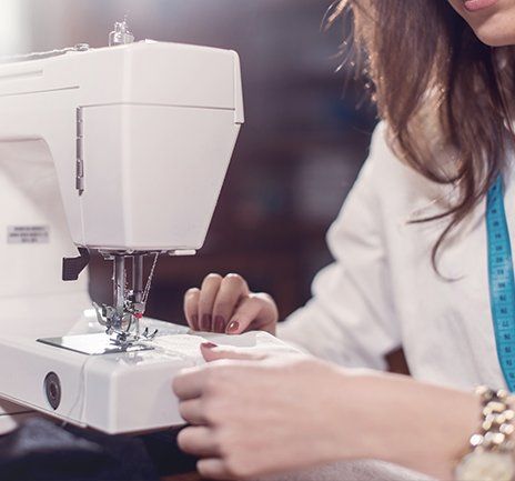 Sewing Machine Shop —Woman Using Sewing Machine in Altoona, PA