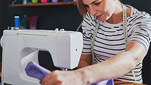 Machine Repair — Woman Using Sewing Machine in Altoona, PA