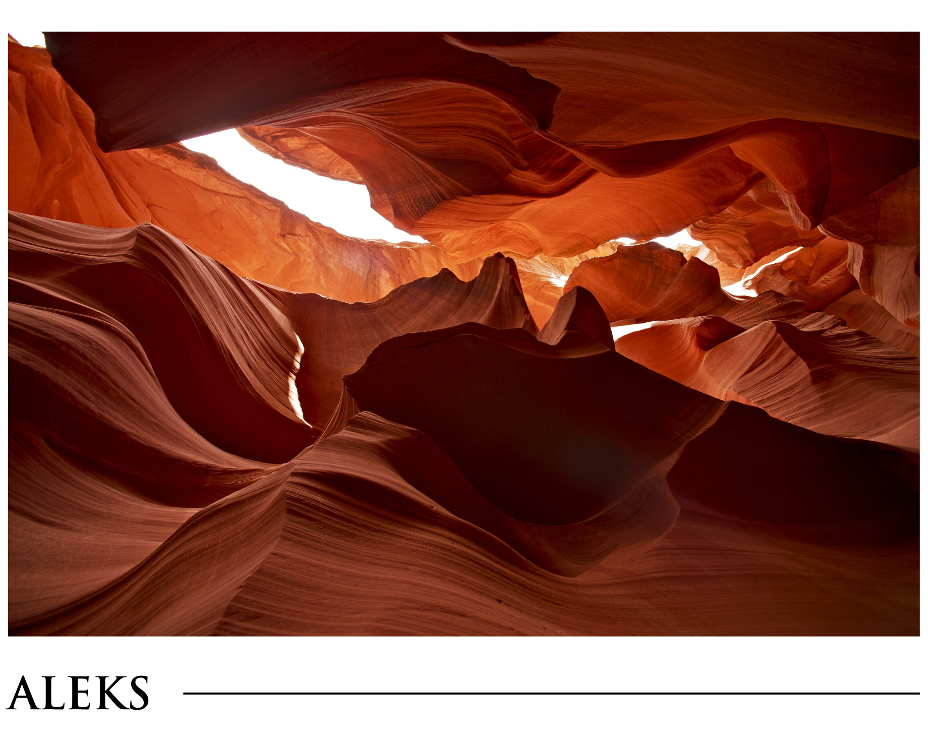 A picture of a canyon with the name aleks at the bottom
